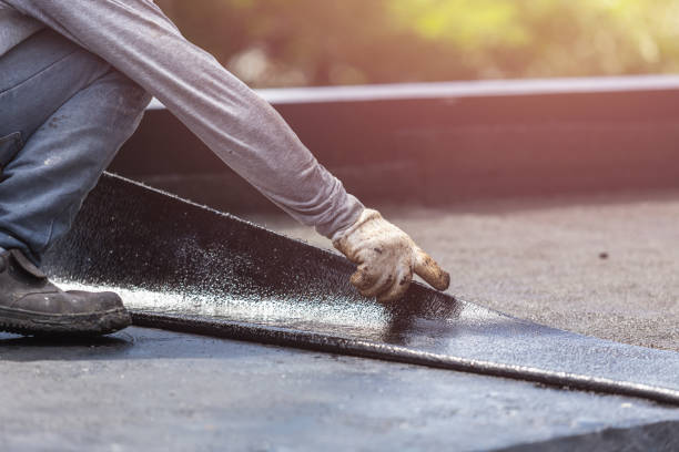 Professional Basement Waterproofing technician working in Wilder, KY